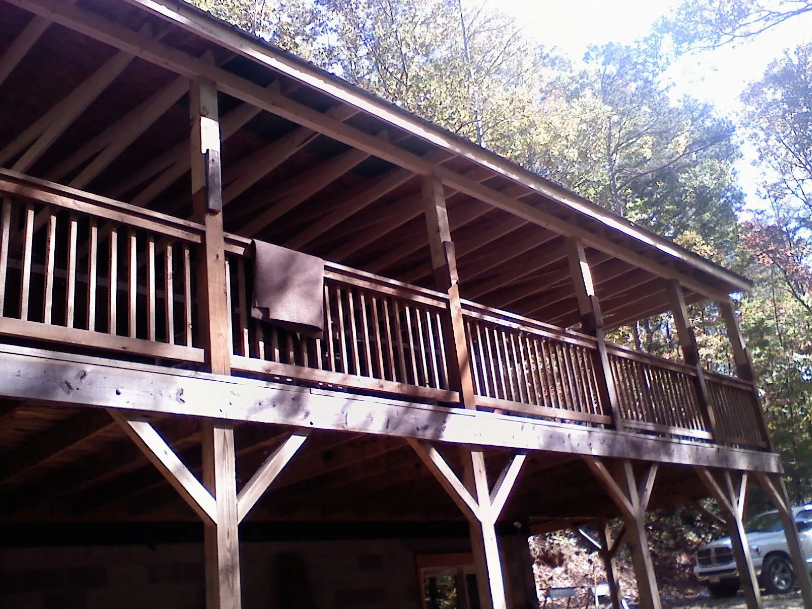 Timber framing under a new elevated porch and deck — Roof Leak Repair in Coal Center by Roofing Brothers